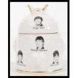 An unusual 20th Century Beatles advertising honey pot having bee finial lid. The pot decorated