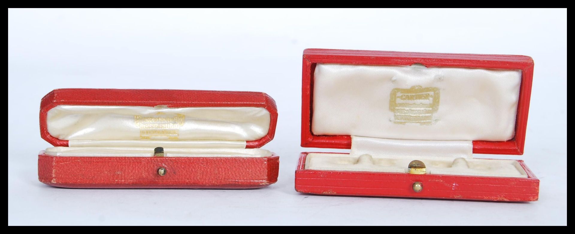 Two vintage designer Cartier jewellery boxes, one for cufflinks and the other for stick pin, each