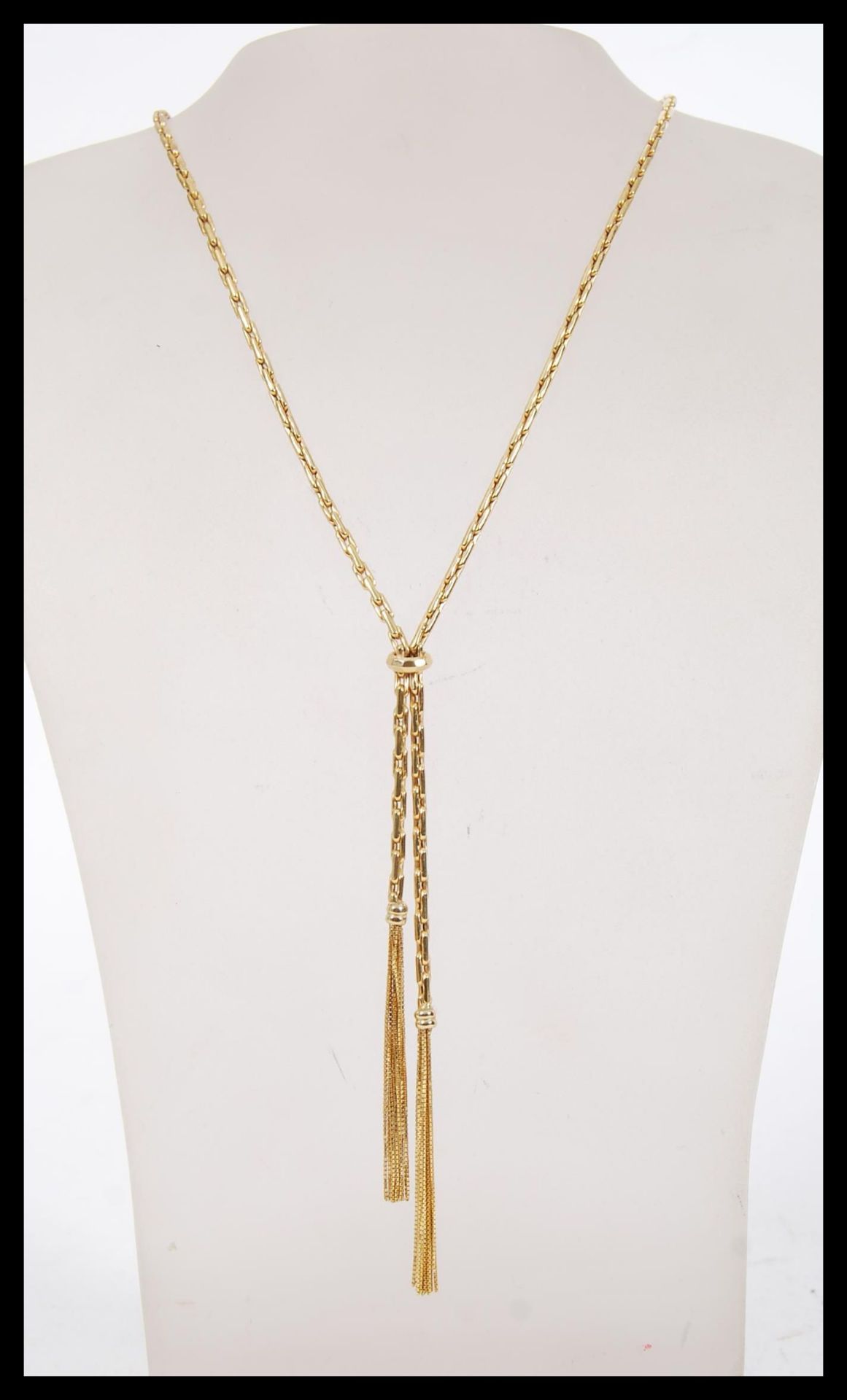 A hallmarked 9ct gold long boxlink necklace chain, having a large bolt ring clasp, with tasseled - Image 2 of 4