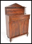A fine 19th century Regency mahogany chiffonier sideboard. Raised on shaped supports with twin