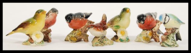 A selection of Beswick ceramic bird figurines to include Chaffinch 991, Wren, Blue Tit 992, two