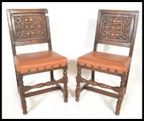 A pair of 19th Century Victorian Cromwellian oak dining chairs raised ion block and turned legs with