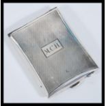 An early 20th Century hallmarked silver 1930's Art Deco vesta match case having engine turned