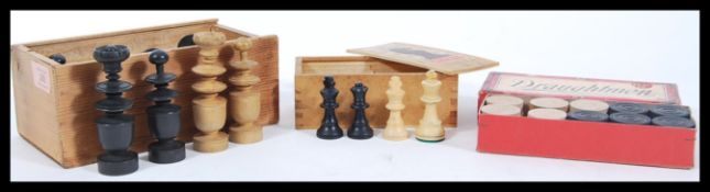 A group of vintage games to include a boxwood and ebony chess set, Gibson chess set and a boxed