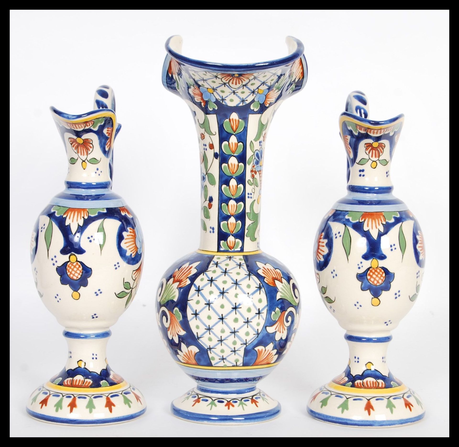 A set of three 20th Century Faience graduating baluster jugs raised on circular bases with bulbous - Image 2 of 5