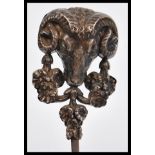 An early 20th Century French silver paper knife letter opener having a large rams head with floral