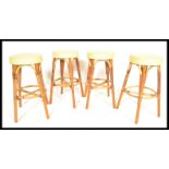 A set of four vintage retro 20th Century bar stool by Angraves of Leicester with rattan / wicker