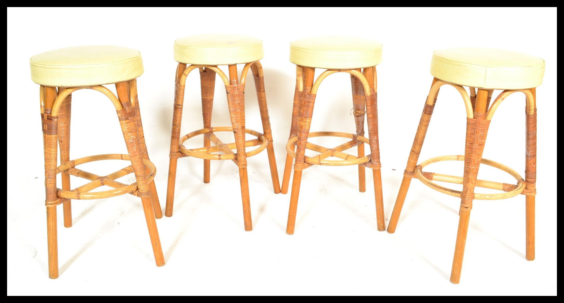 A set of four vintage retro 20th Century bar stool by Angraves of Leicester with rattan / wicker