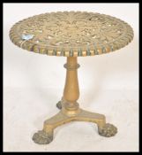 A 19th Century Victorian brass trivet stand table