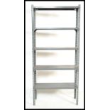 A 20th century Industrial manner metal shelf - rack of upright form with multiple shelves and in