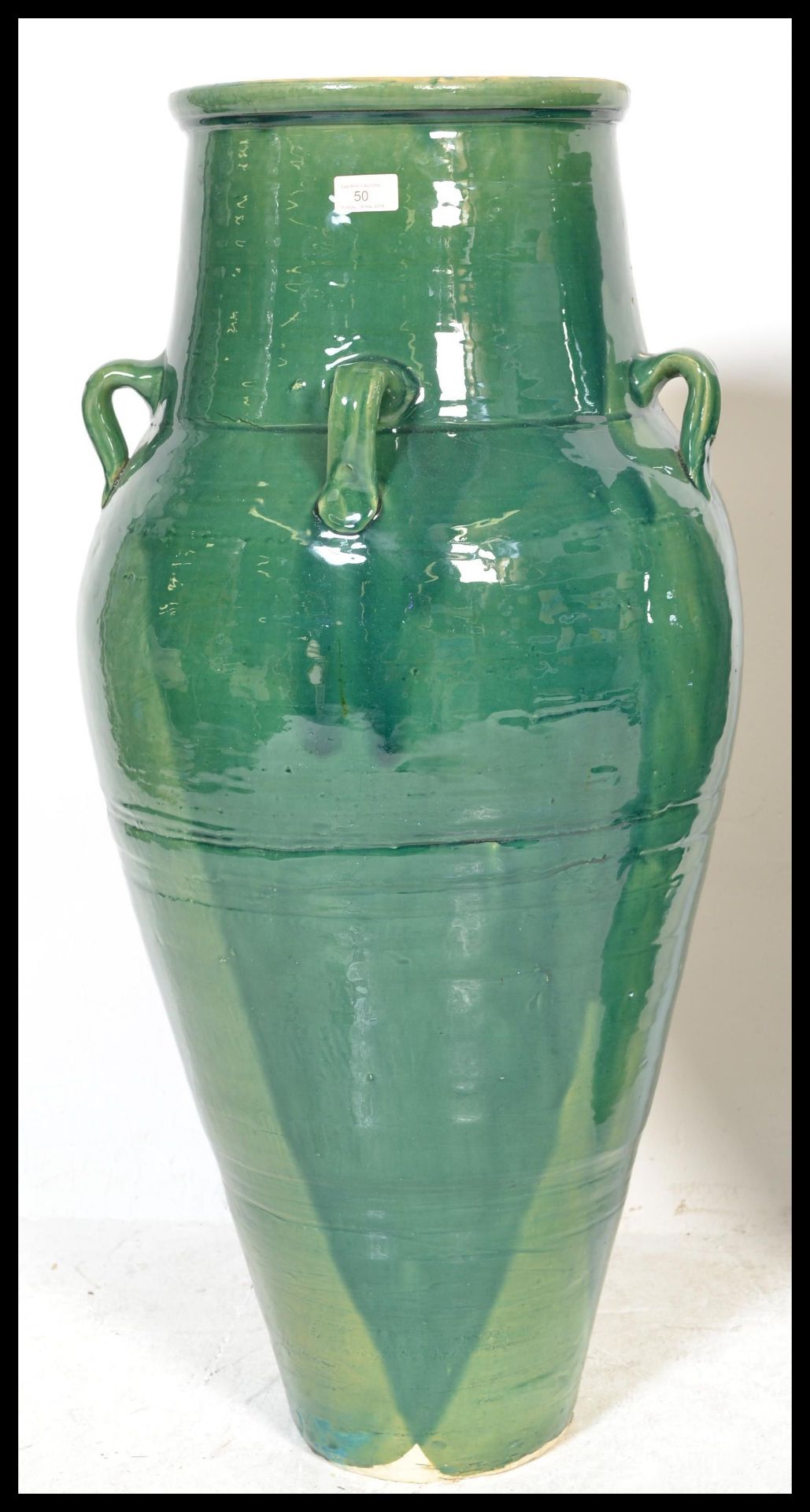 A large and impressive pair of Persian Sharab green glazed wine vessels of amfora form having four - Bild 2 aus 6