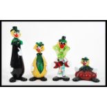 A group of four vintage retro 20th Century Murano studio art glass clowns in the form of fruits to