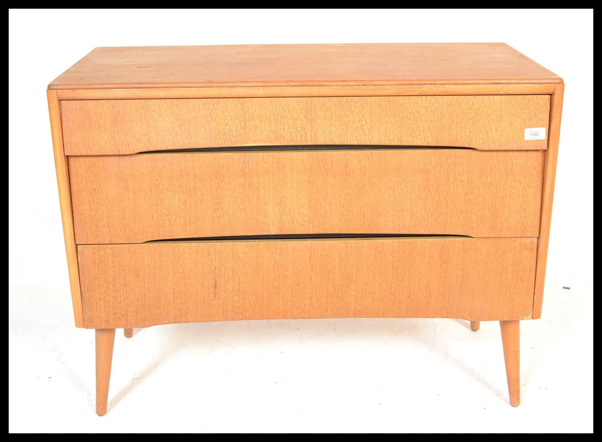 A vintage retro mid 20th Century teak wood Beehive fronted chest of drawers having a bank of three - Bild 2 aus 12