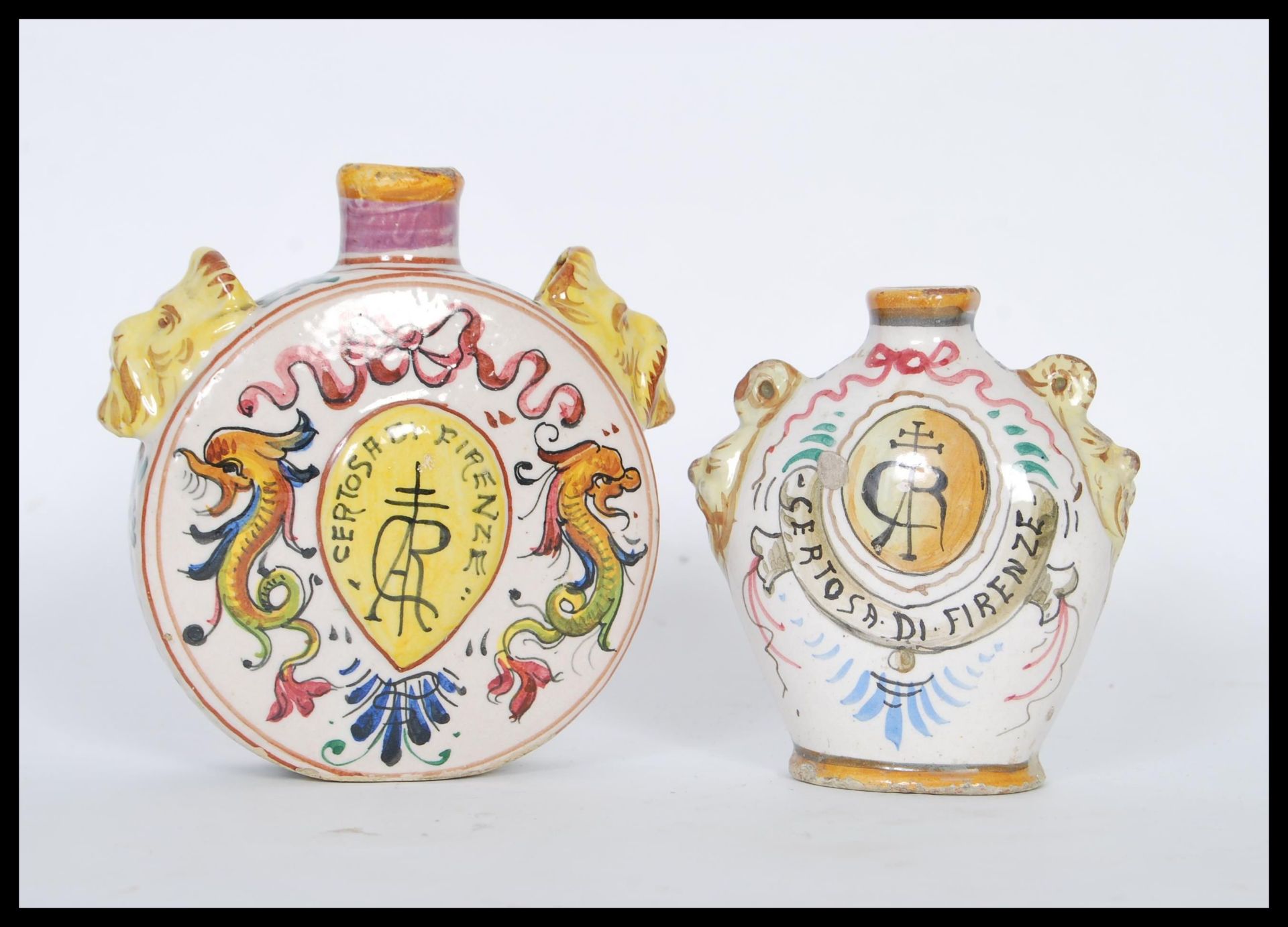 Two 20th Century Grand Tour faience continental Certosa Di Firenze ceramic bottles to include a moon