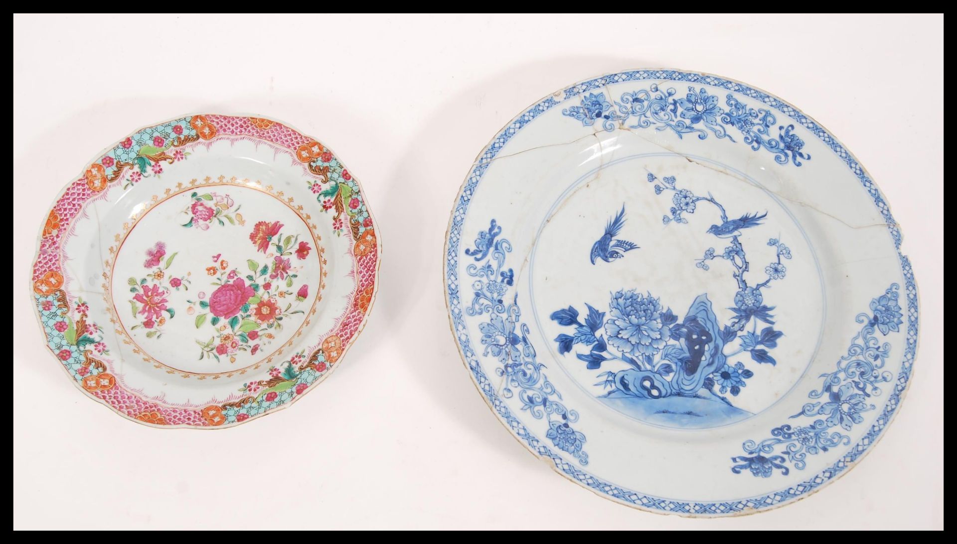 Two 18th Century Chinese plates to include a famille rose example of circular form and a blue and