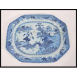 A late 18th Century Chinese large blue and white charger plate tray of octagonal form. Hand