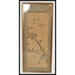 A Japanese late 19th Century Meiji period hand painted silk panel depicting birds and trees.