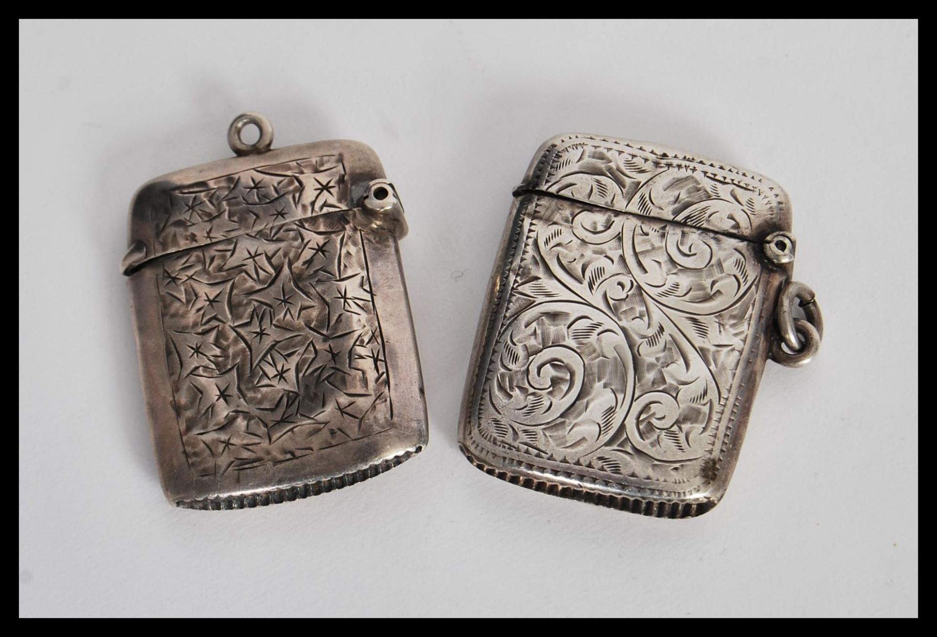 Two early 20th Century hallmarked silver vesta match cases having engraved scrolled decoration - Image 2 of 4