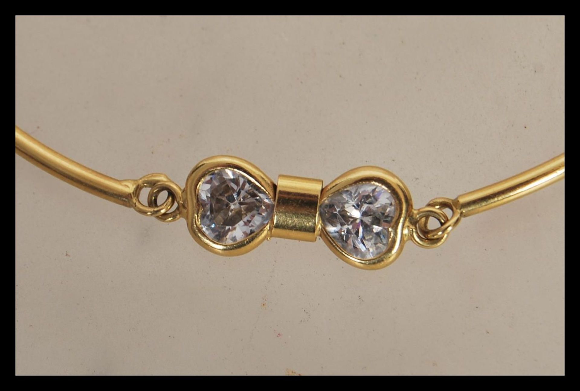 A stamped 750 18ct gold spacer bracelet set with six white stones, having a lobster clasp. Weight - Image 2 of 3