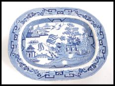 A 19th Century Victorian Staffordshire meat pattern transfer printed in the willow pattern having an