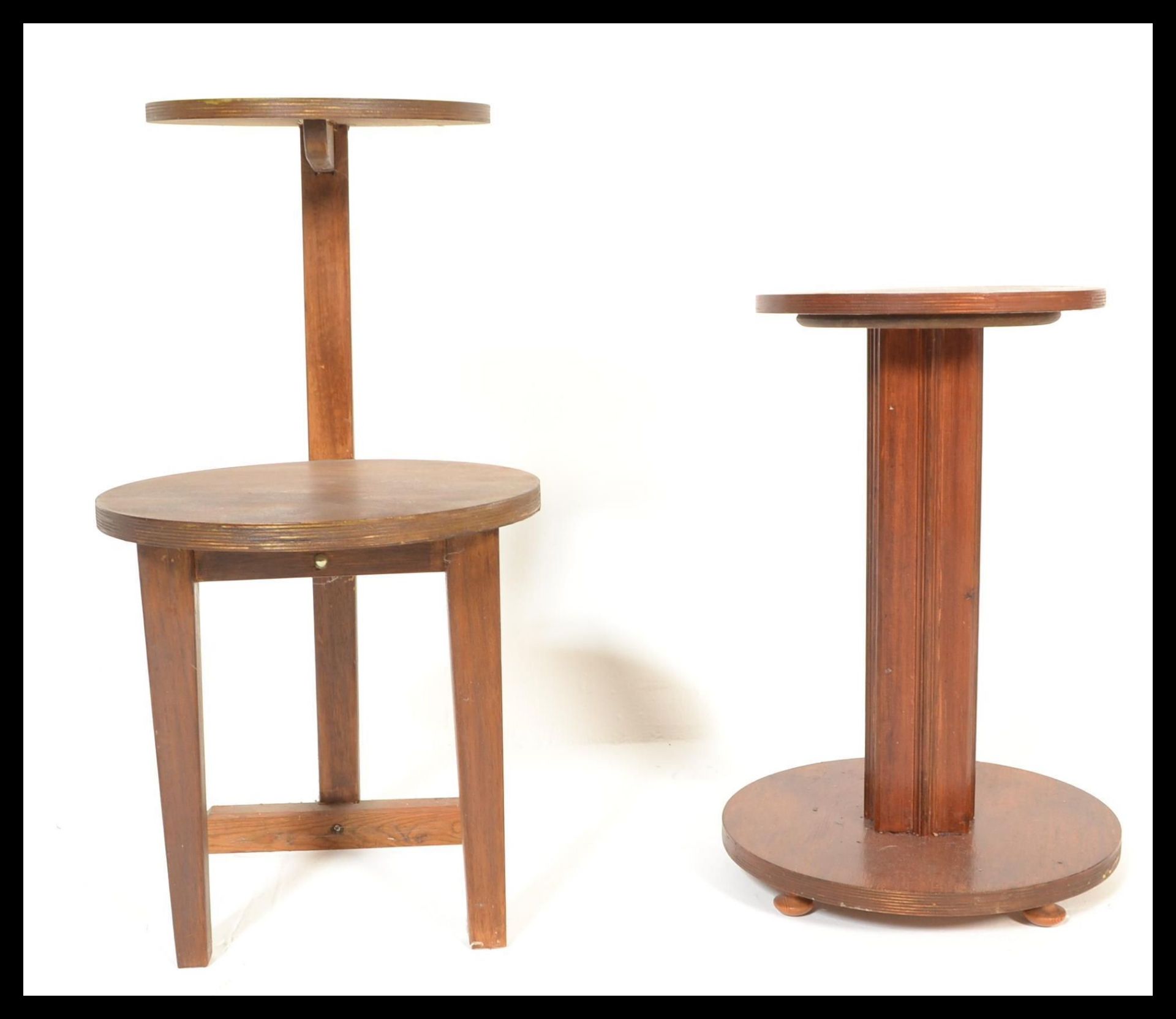 A 20th Century Art Deco mahogany circular occasional side table together with a walnut two tiered
