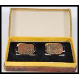 A pair of early 20th Century hallmarked 9ct gold Art Deco gents cufflinks of octagonal form having