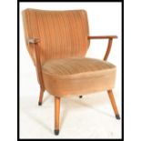 A vintage mid 20th Century German cocktail / elbow chair, the open framed chair having over