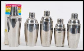 A group of five vintage retro 20th Century Art Deco stainless steel / silver plated cocktail shakers
