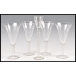 A set of five 19th Century Victorian drinking glasses comprising of a set of four wine glasses