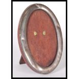 A silver hallmarked mahogany backed easel mirror o