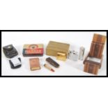 A collection of vintage 20th Century smoking related items to include a Ronson Service Outfit tin, a