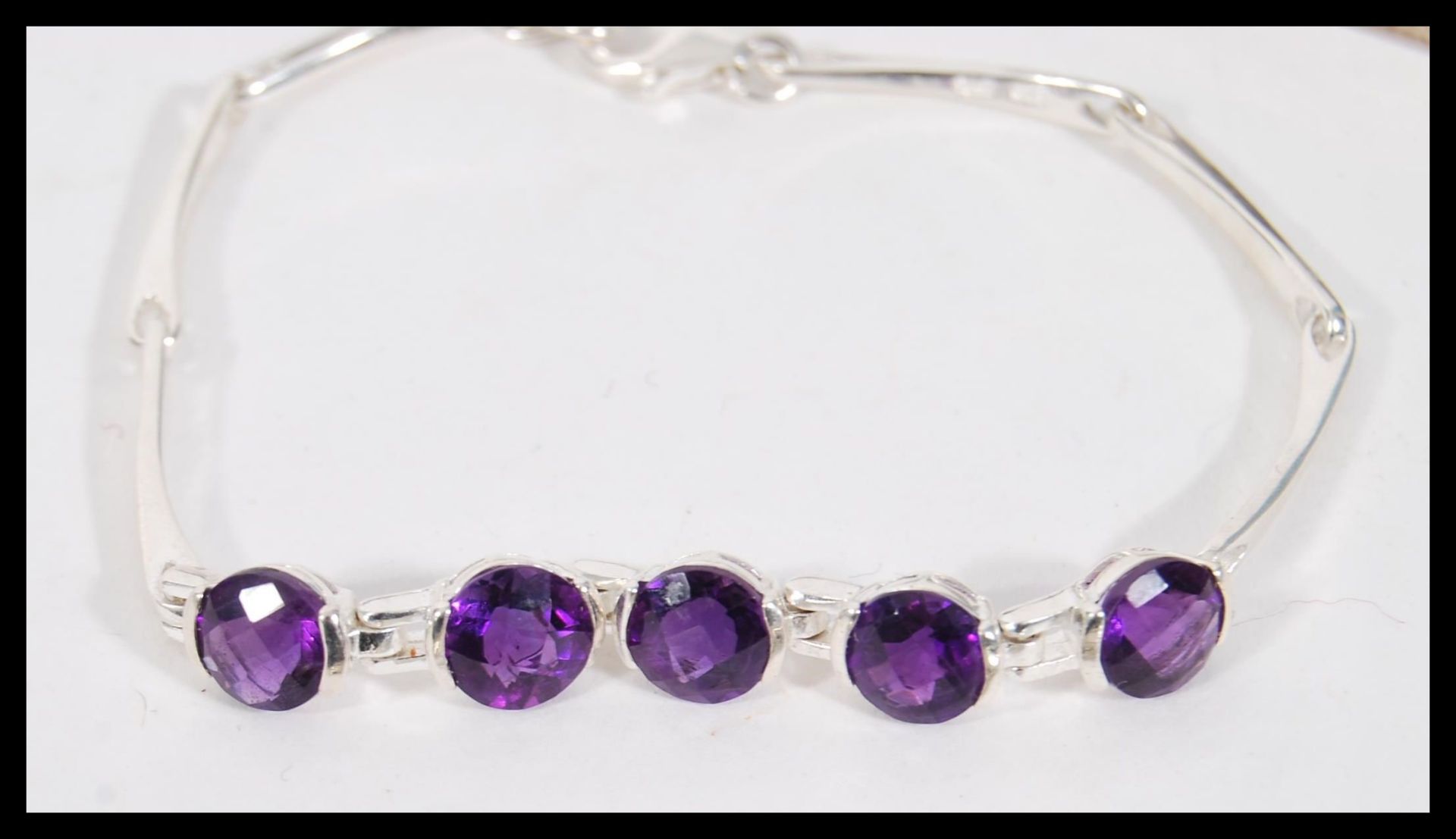 A selection of silver bracelets to include a square bangle with a hinge opening, a child's bangle - Image 2 of 5