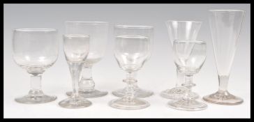 A group of eight 18th / 19th Century Georgian glass drinking glasses to include a pair of bladed