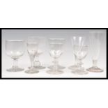 A group of eight 18th / 19th Century Georgian glass drinking glasses to include a pair of bladed