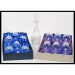 A boxed set of six Edinburgh cut crystal continental collection wine glasses along with a set of six