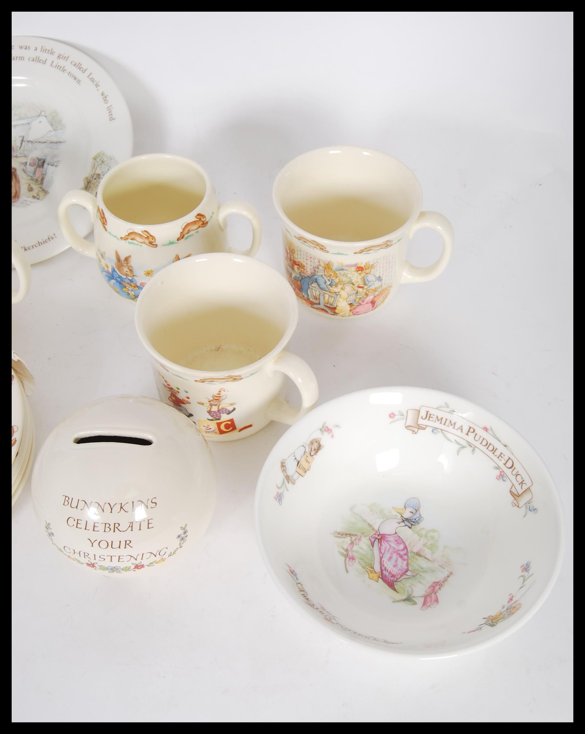 A collection of Royal Doulton ' Bunnykins ' ceramics to include small plates, mugs, money boxes, a - Image 4 of 4