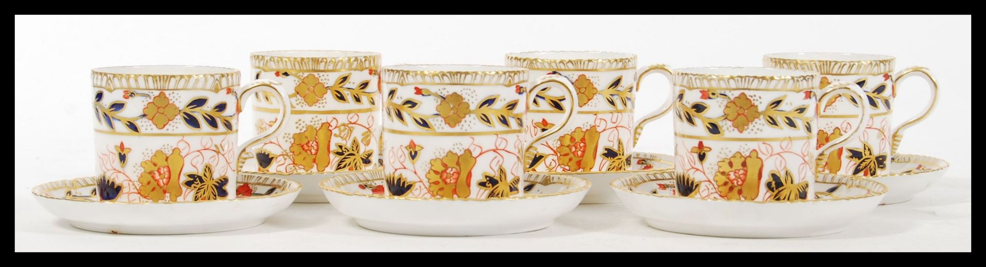 A set of six Royal Crown Derby Imari A 462 pattern tea cups and saucers having hand painted floral