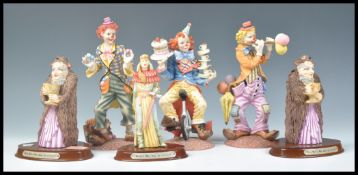 A group of Leonardo figurines to include three clowns from the 1997 Clowning Around series, King