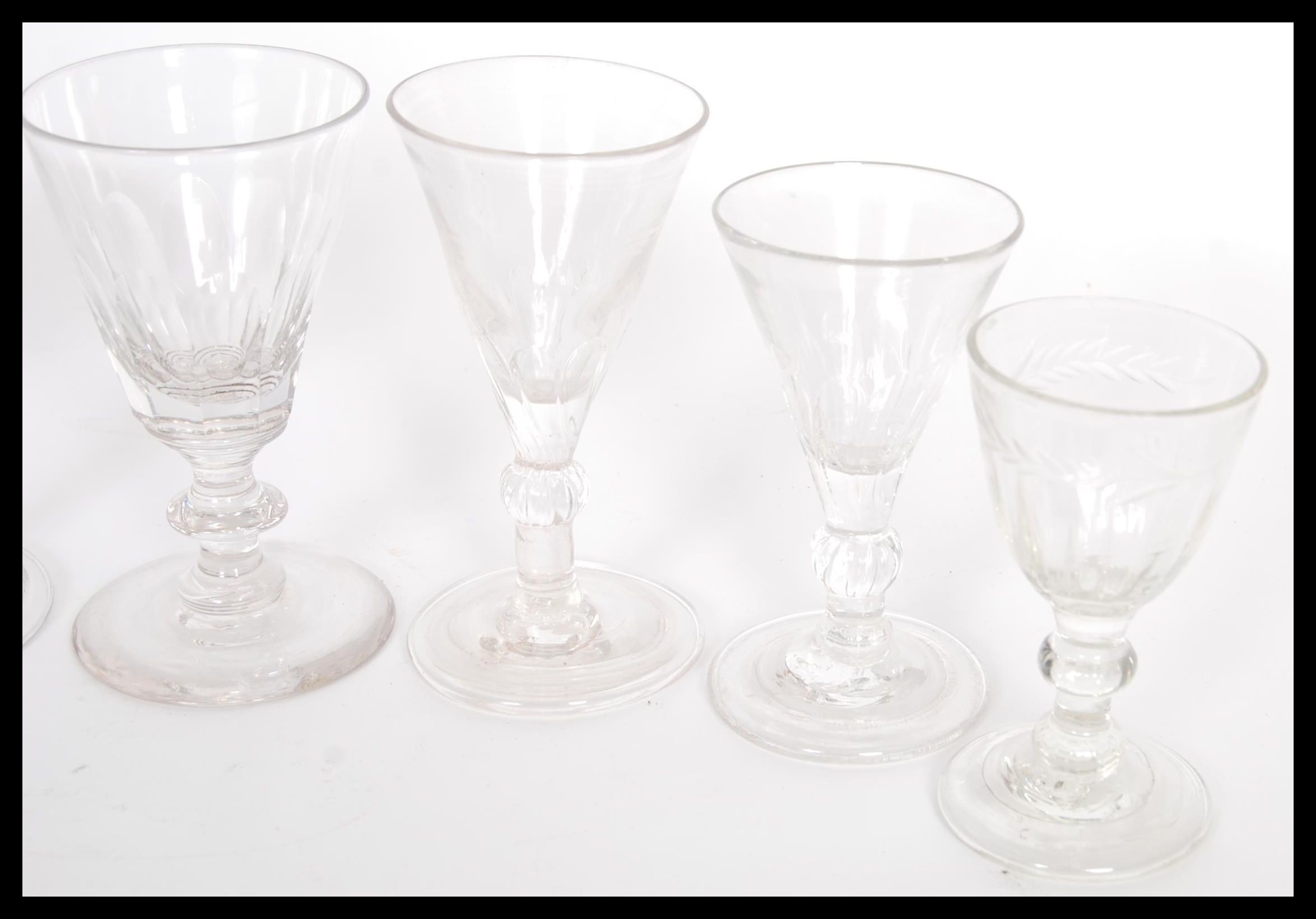 A group of eight 18th / 19th Century Georgian glass drinking glasses to include faceted and etched - Image 4 of 5