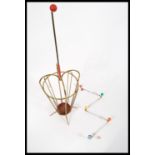 Two vintage retro 20th Century sputnik atomic style items to include a W coat hook with colored ball