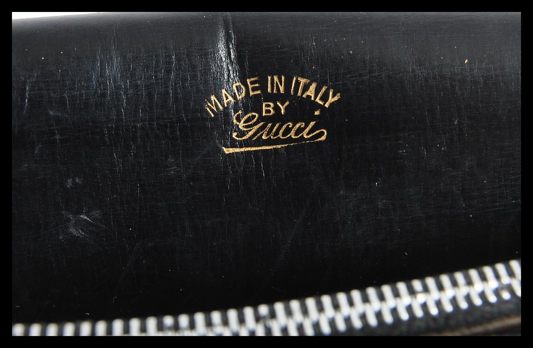 A 20th Century original designer Gucci black leather handbag with gilt metal interlocking G clasps - Image 5 of 6