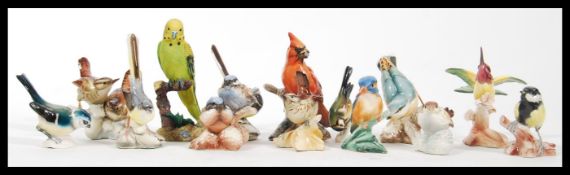 A collection of vintage 20th Century ceramic bird figurines to include Goebel birds and a