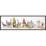 A collection of vintage 20th Century ceramic bird figurines to include Goebel birds and a