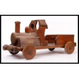 VINTAGE CARVED WOODEN HAND MADE PUSH ALONG TRAIN LOCO