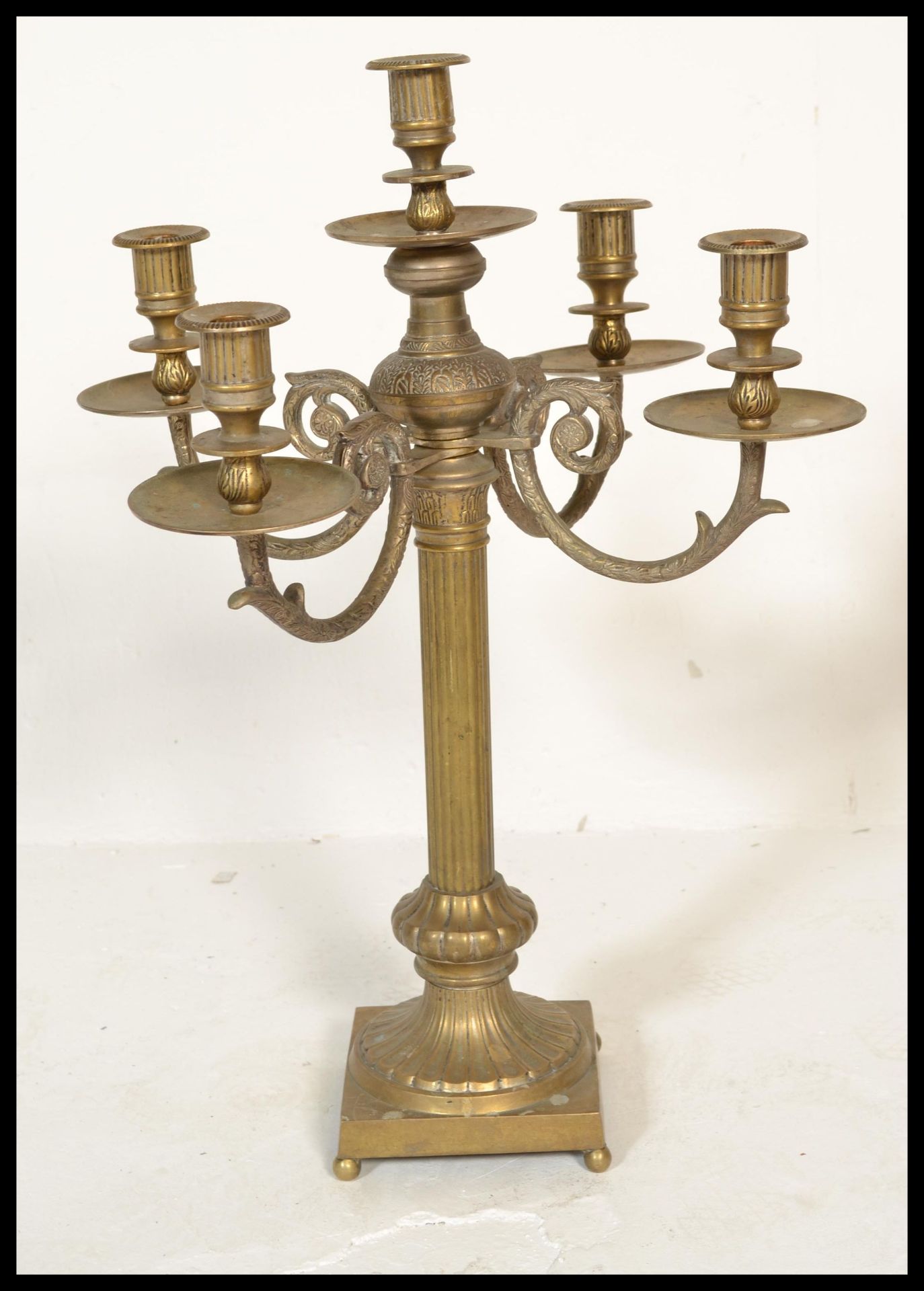 A very large and impressive early 20th Century tall brass candelabra multi branch candlestick raised