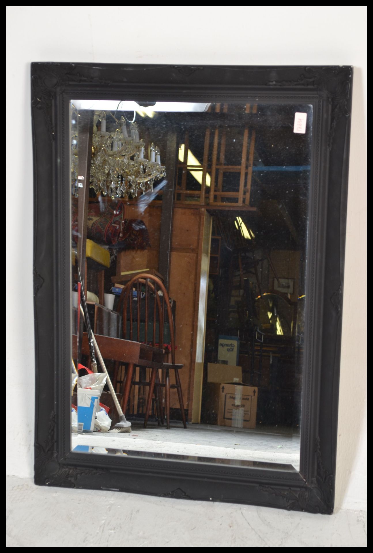 A antique style large ornate bevelled glass mirror set to an ebonised frame with scroll and leaf - Bild 2 aus 5
