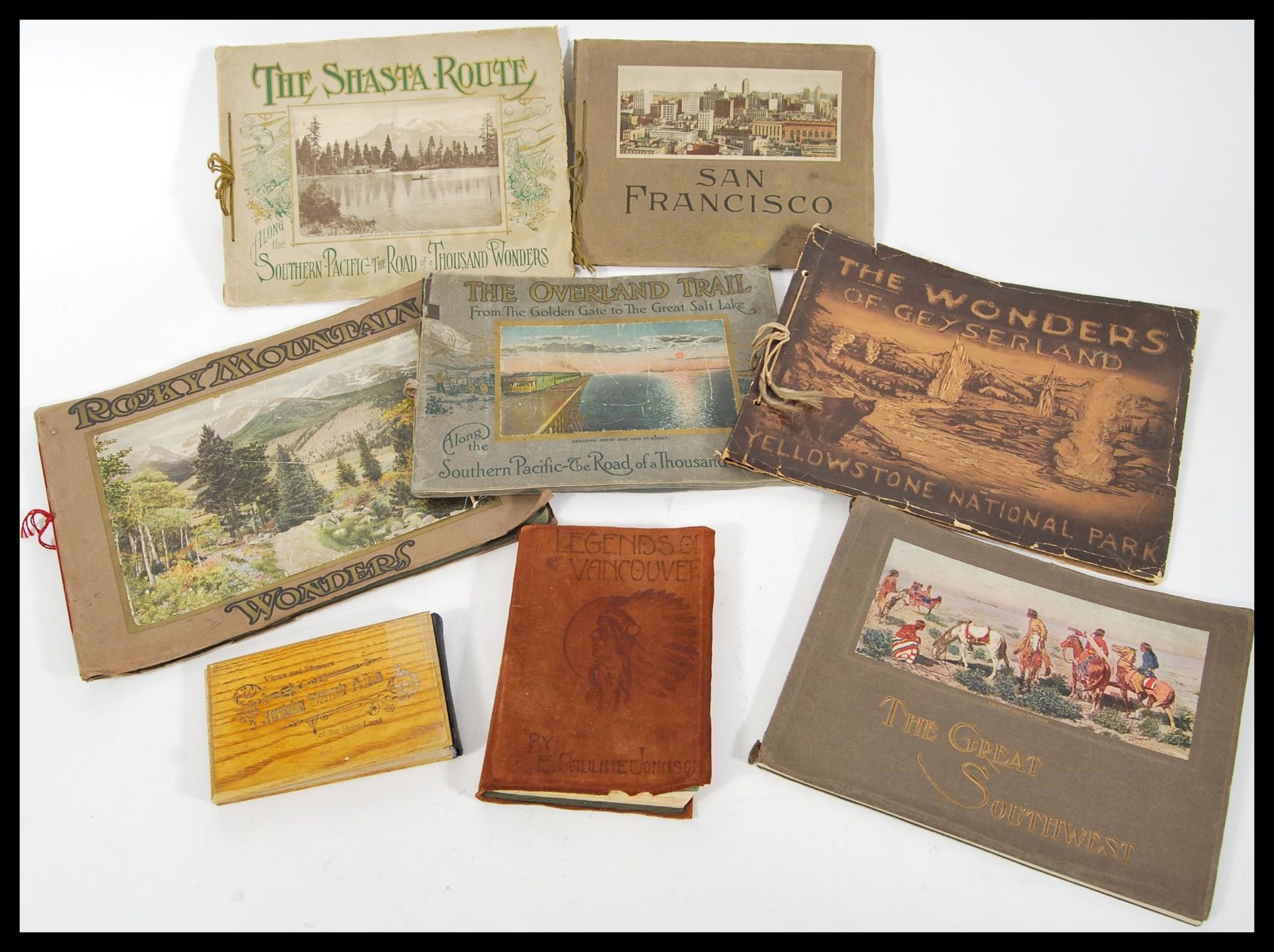A collection of seven travel related folio books to include Legends of Vancouver E Pauline