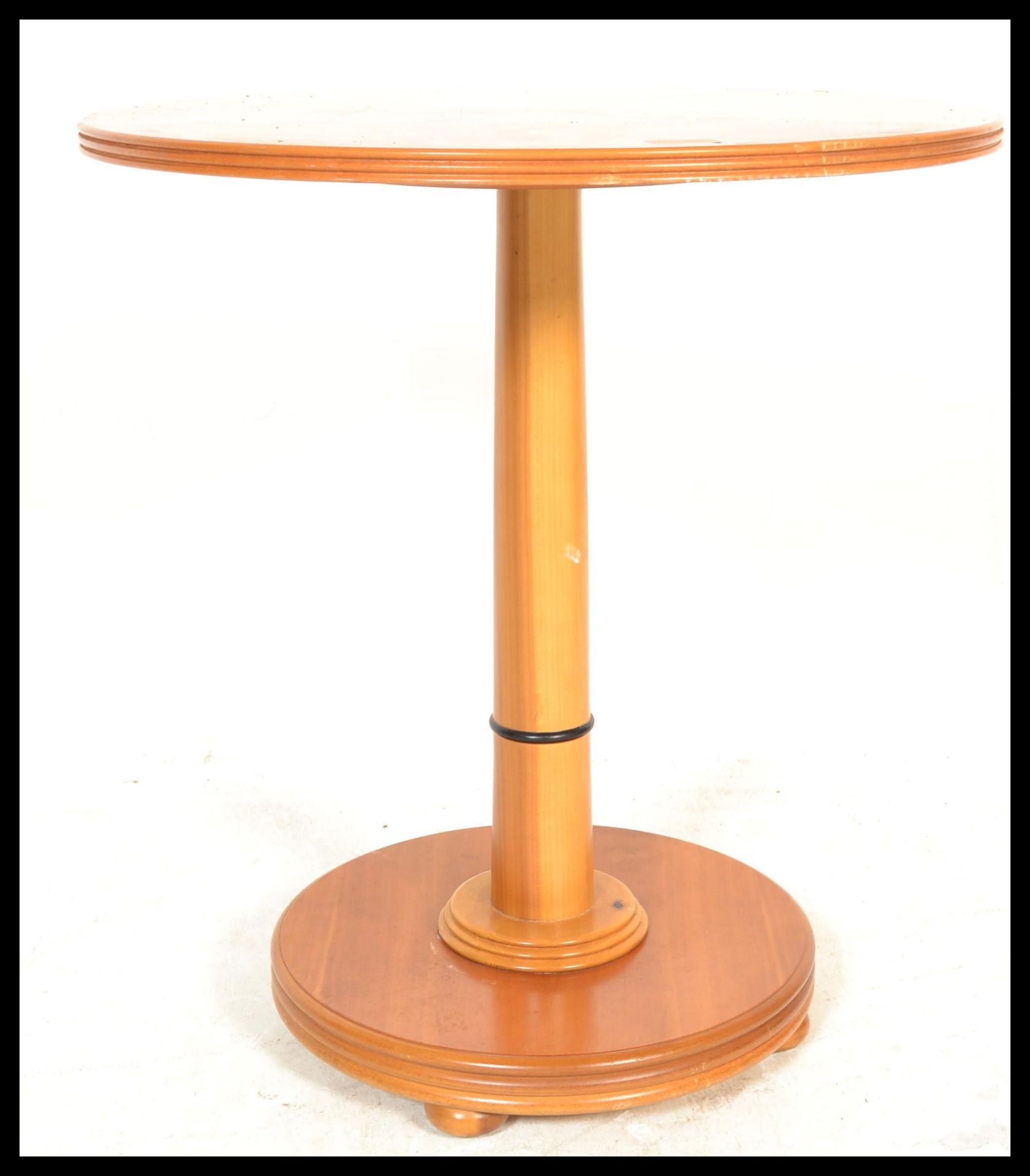 A vintage retro 20th Century John Tanus round dining table, having a round teak wood top and base