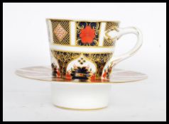 A Royal Crown Derby trembleuse tall cup and saucer in the Old Imari pattern with gilt detailing