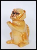 An early 20th Century Wood & Sons Art Deco 1930's novelty teapot in the form of a pekingese dog.
